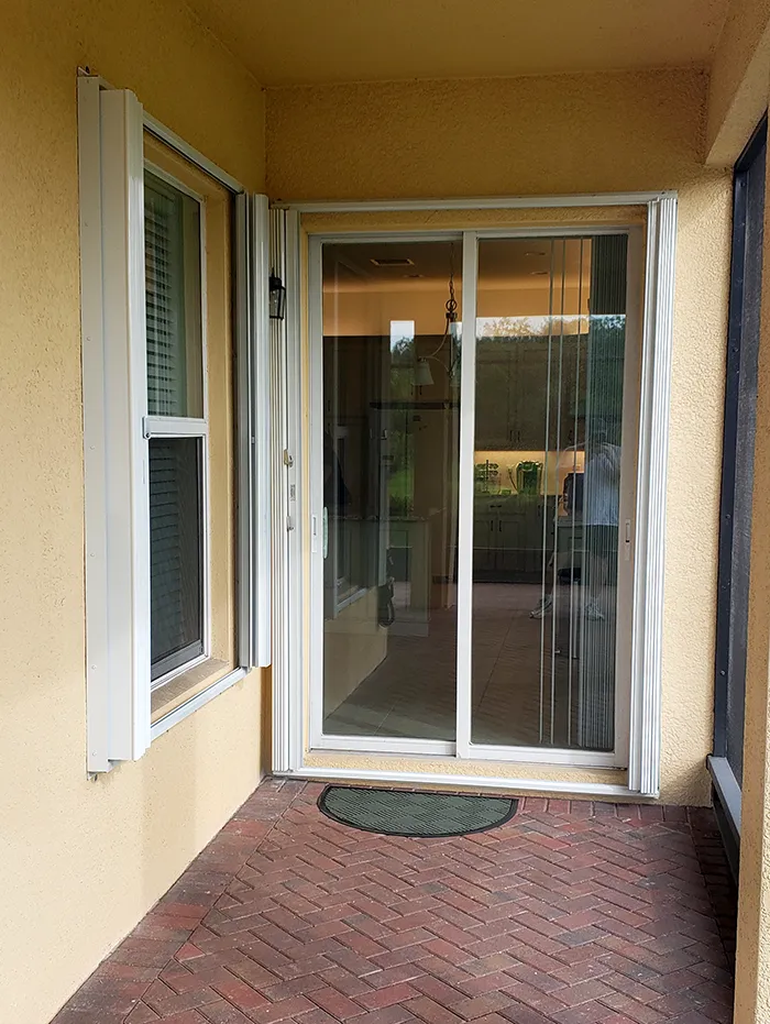 Hurricane protection with residential hurricane shutters